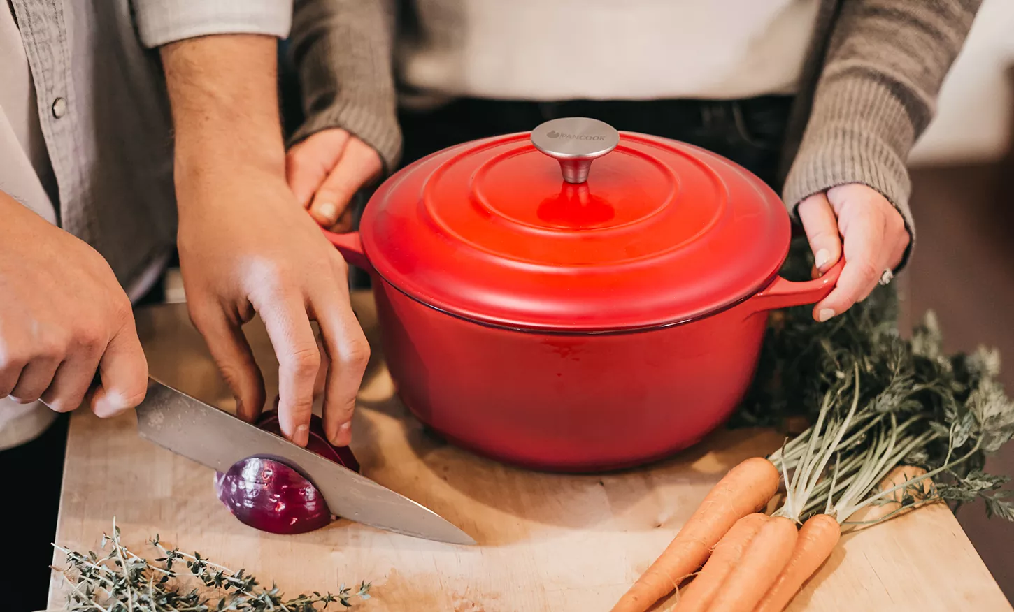 Red casseroles photography in the kitchen